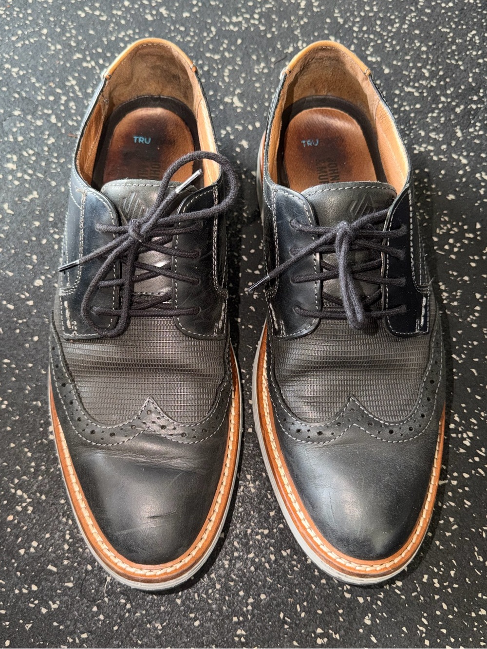Johnston & Murphy Black Leather Wingtip Oxfords with Tan Welt